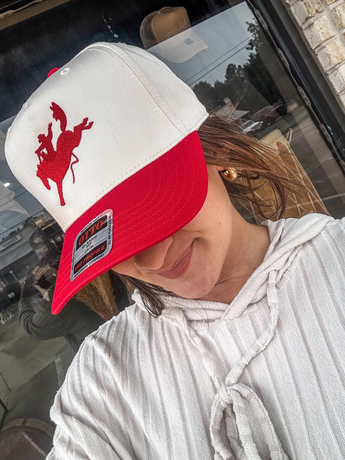 The Red Buckin Bronc Cap
